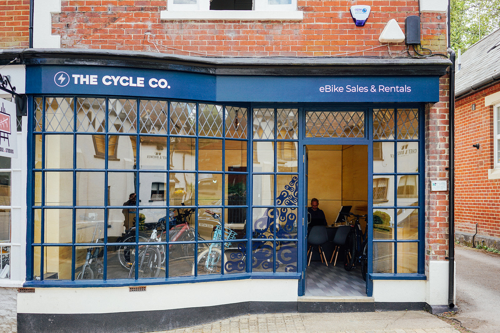 front of The Cycle Company store in Winchester